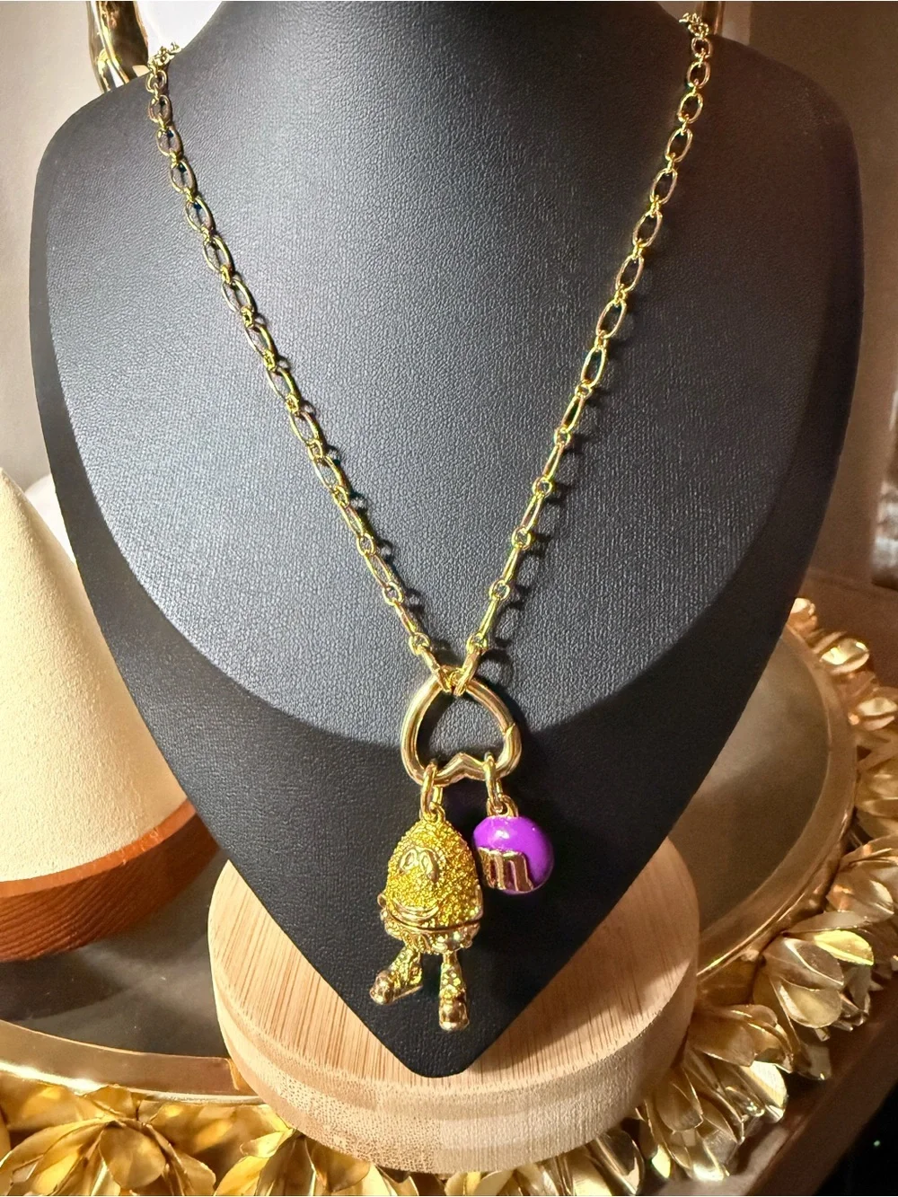 kate spade Gold Tone Necklace with Purple M&M Charm